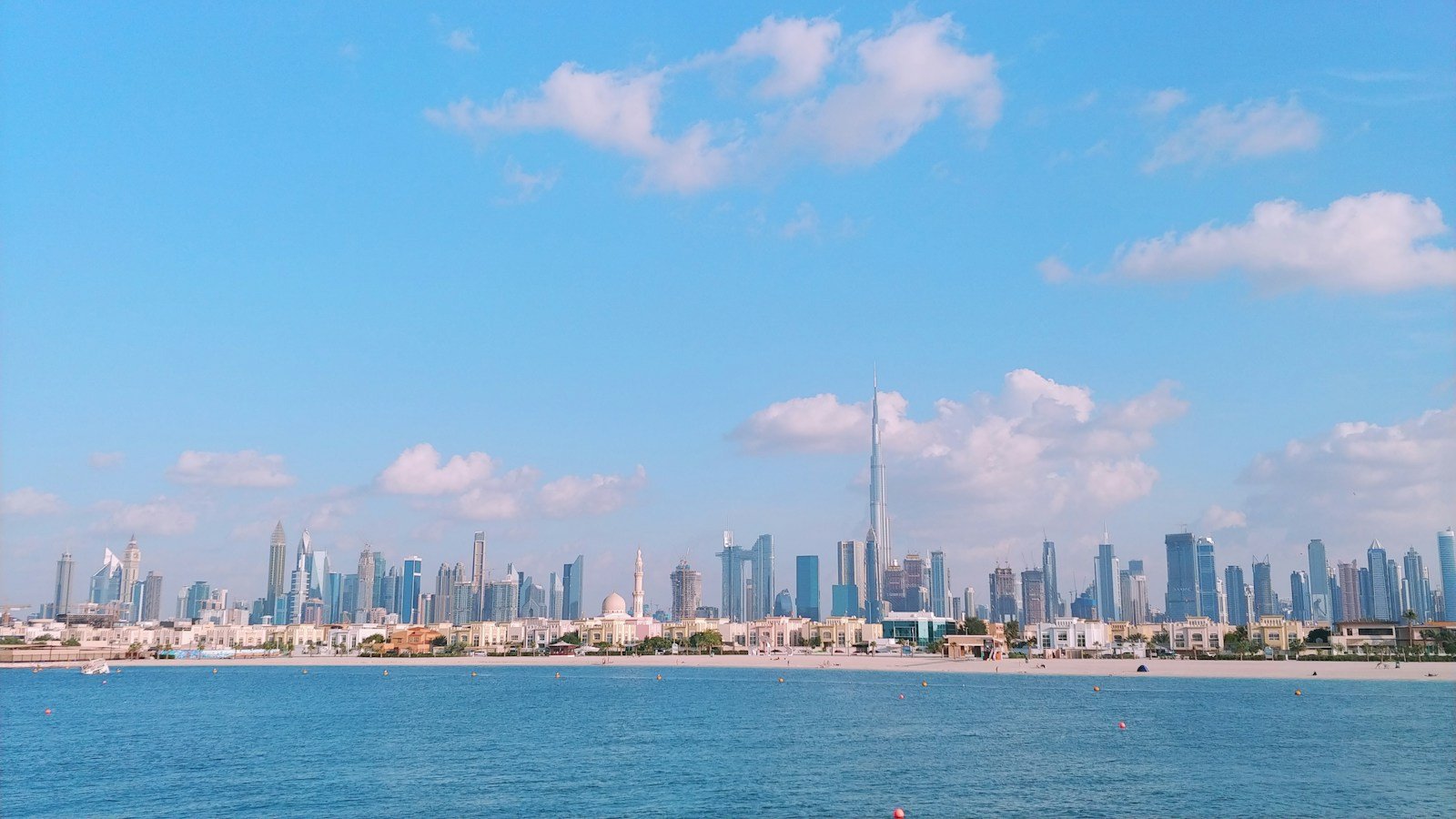 Dubai waterfront skyline with the Burj Khalifa.